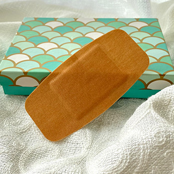 Buy Fabric Bandaids, Large, Pack of 10 in an Aqua Armour Box, 2” x 4” at The Surf Haberdashery