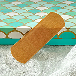 Buy Fabric Bandaids, Regular, Pack of 10 in an Aqua Armour Box, 1” x 3” at The Surf Haberdashery